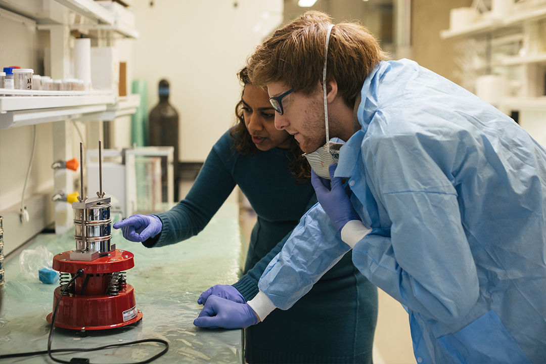 Professor working with student on mechanical engineering research