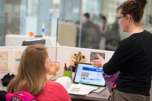 Professor working with student on systems engineering research
